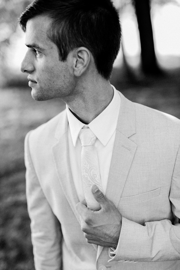 Black and white portrait of groom.