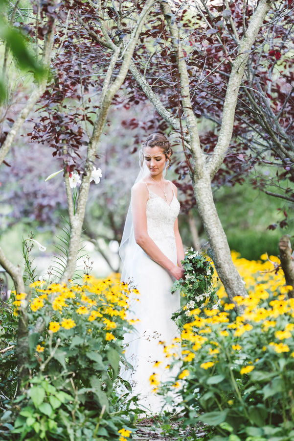 Portrait of bride in a flower garden.