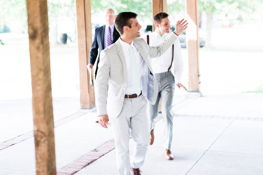 Groom walks into his wedding ceremony.