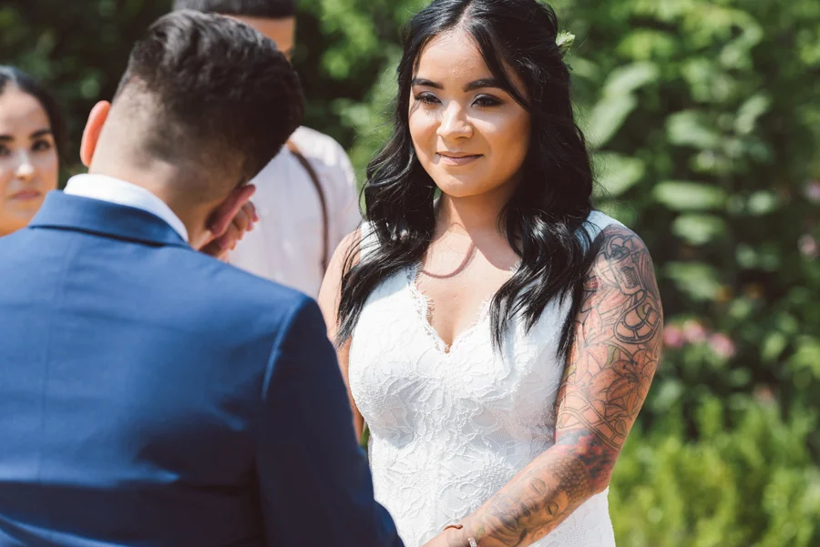 Brides exchange vows at wedding.