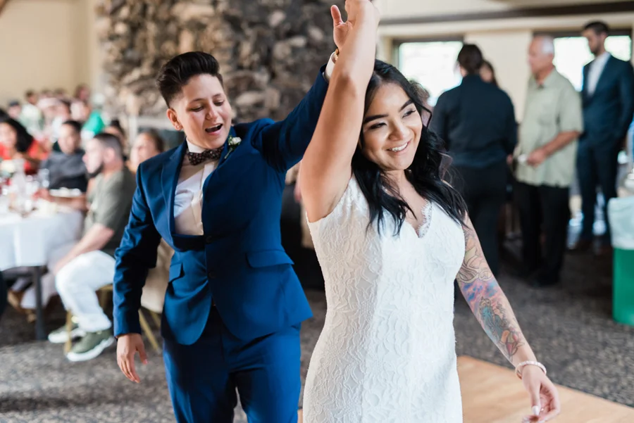 Bride and bride first dance at wedding reception.