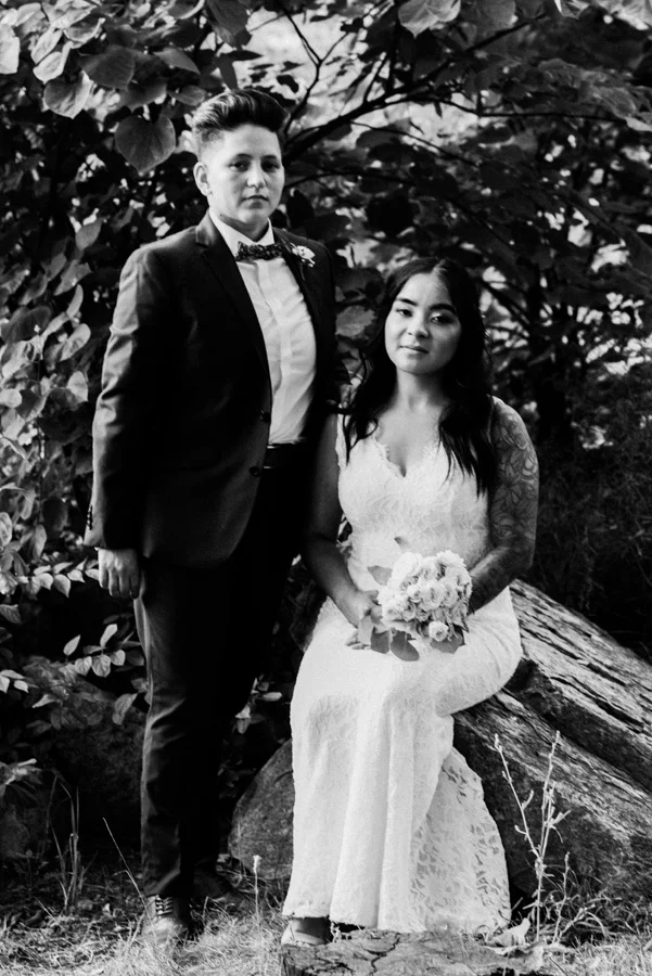 Old time black and white portrait of bride and bride.