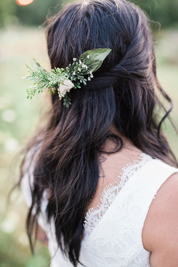Flower detail in bride's hair.