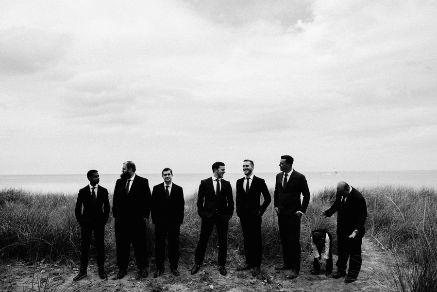 Black and white portrait of groomsmen.