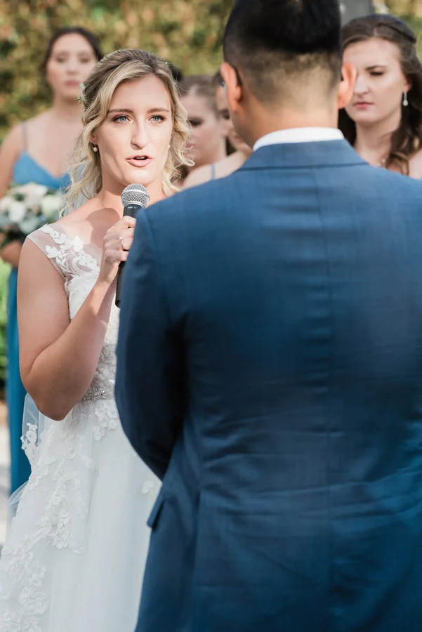 Bride and groom exchange vows.