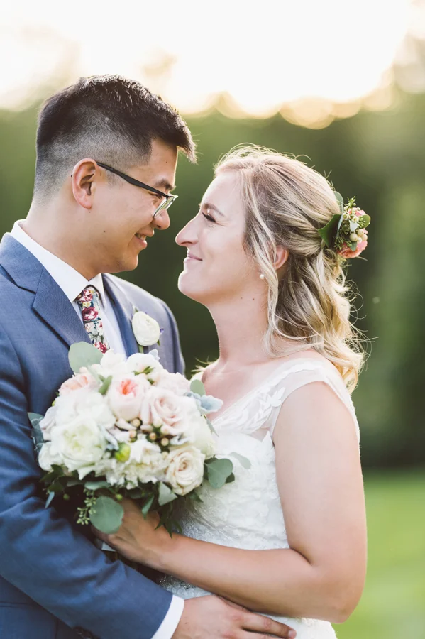 Bride and groom portrait at sunset.