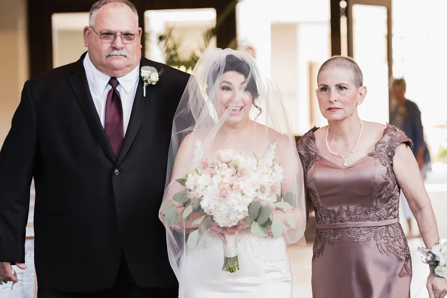 Bride walks down the aisle.