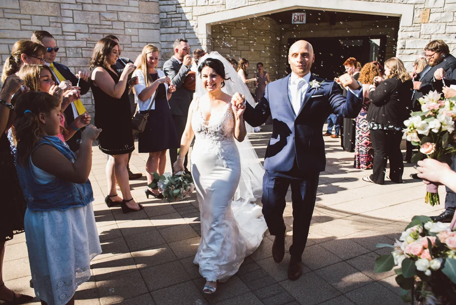Bride and groom exit.