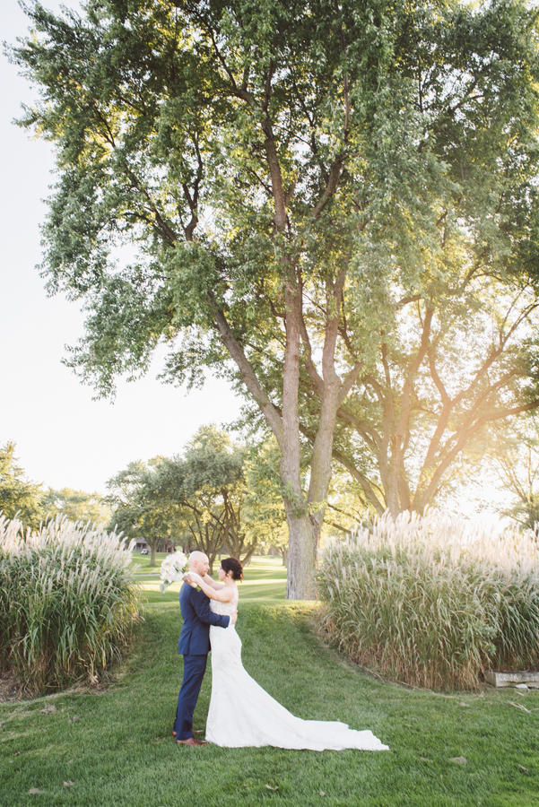 Bride and groom at golf course.