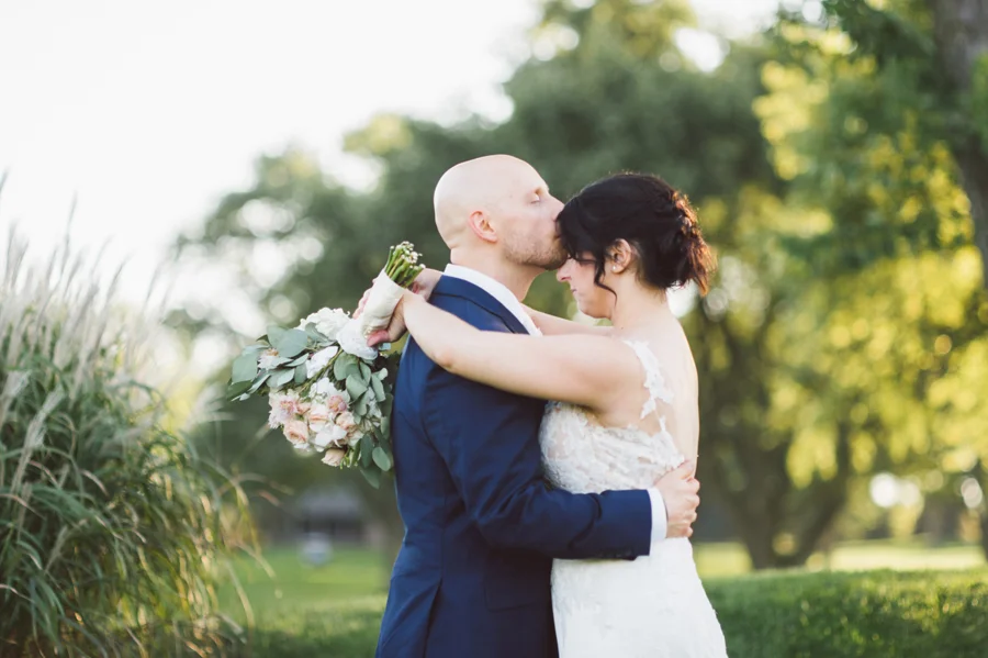 Bride and groom at golf course.