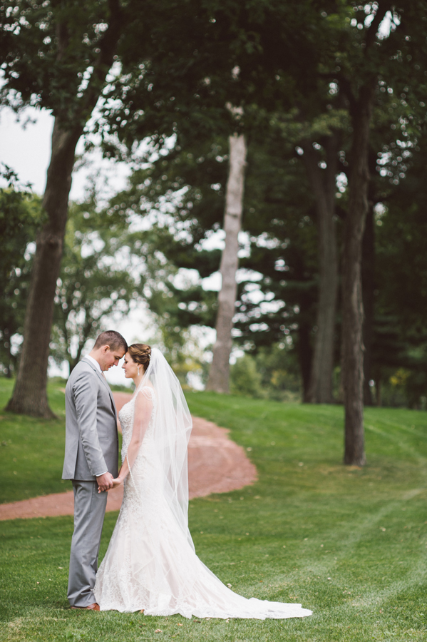 Bride and groom on the golf course.