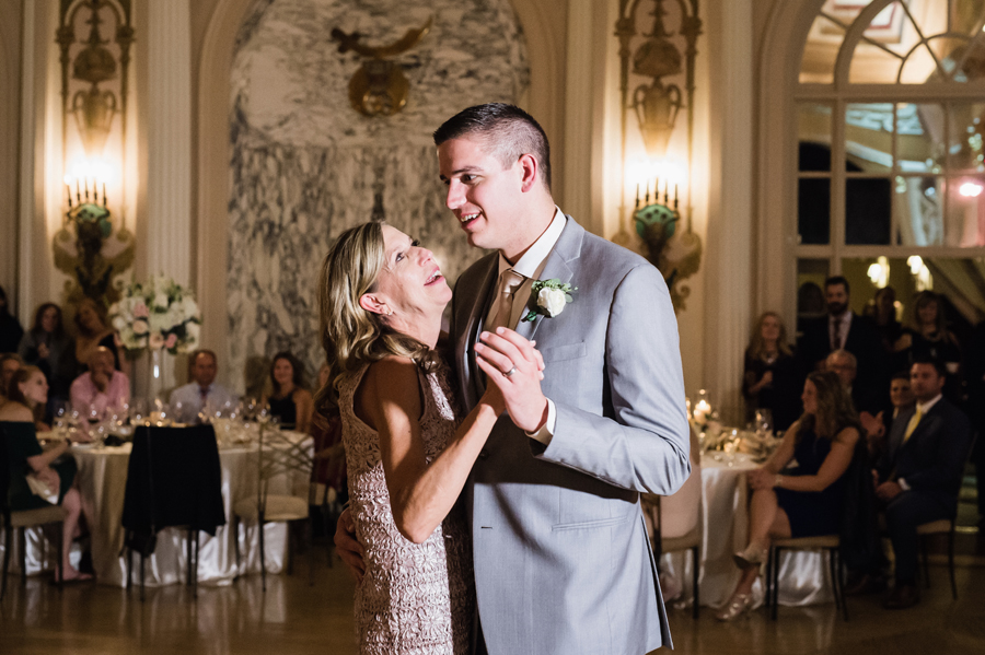 Groom and his mom dance.