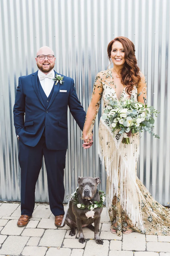 Bride and groom and their dog.