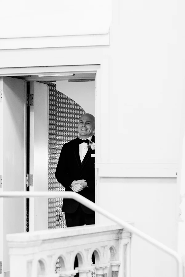 Groom waiting to walk into ceremony.