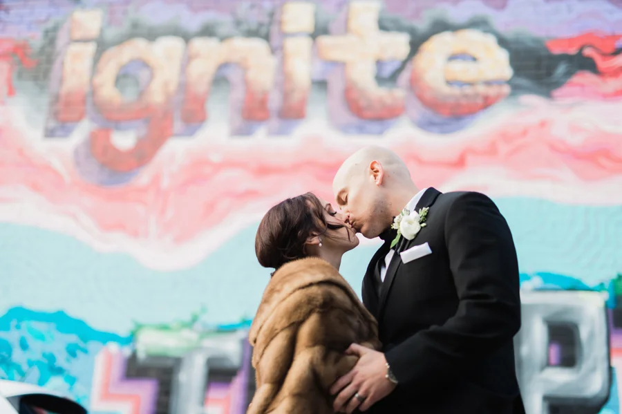 Bride and groom at Ignite Glass Studio.