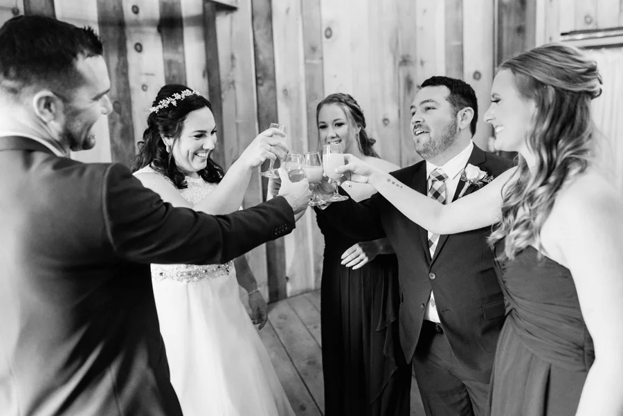 Bride and attendants toast.