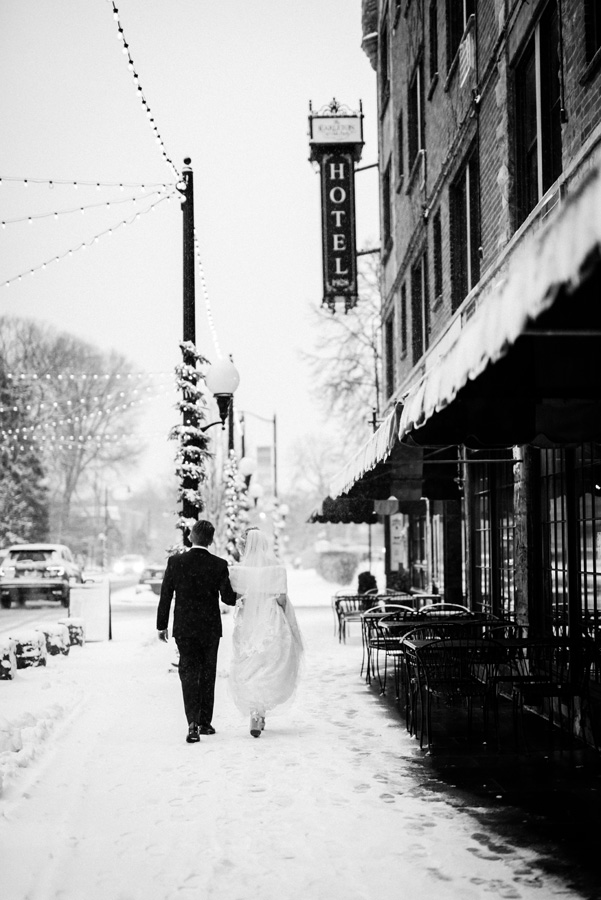 Bride and groom downtown Oak Park on a snowy day.