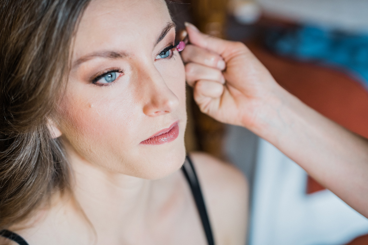 Bride getting her make up done.