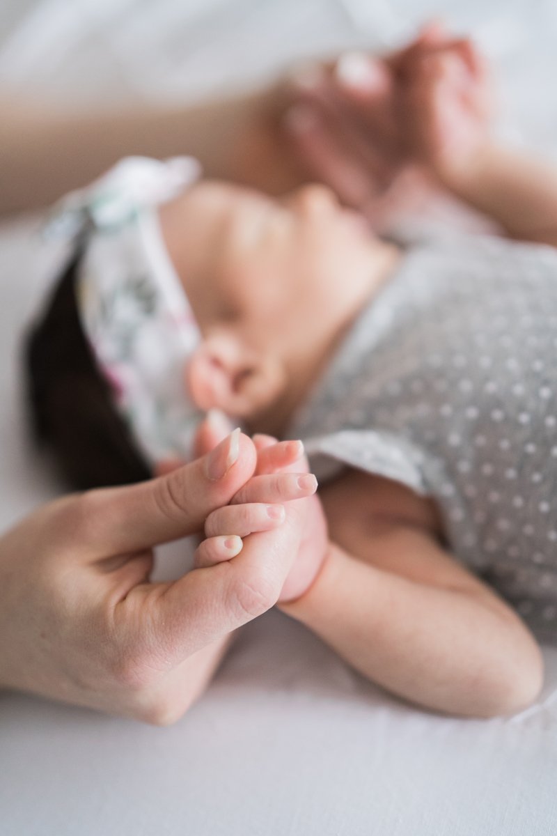 Newborn baby portrait photography by Two Birds Photography. Classic, bright, and happy. Serving Chicago and the suburbs. Image copyright Two Birds Photography 2025.
