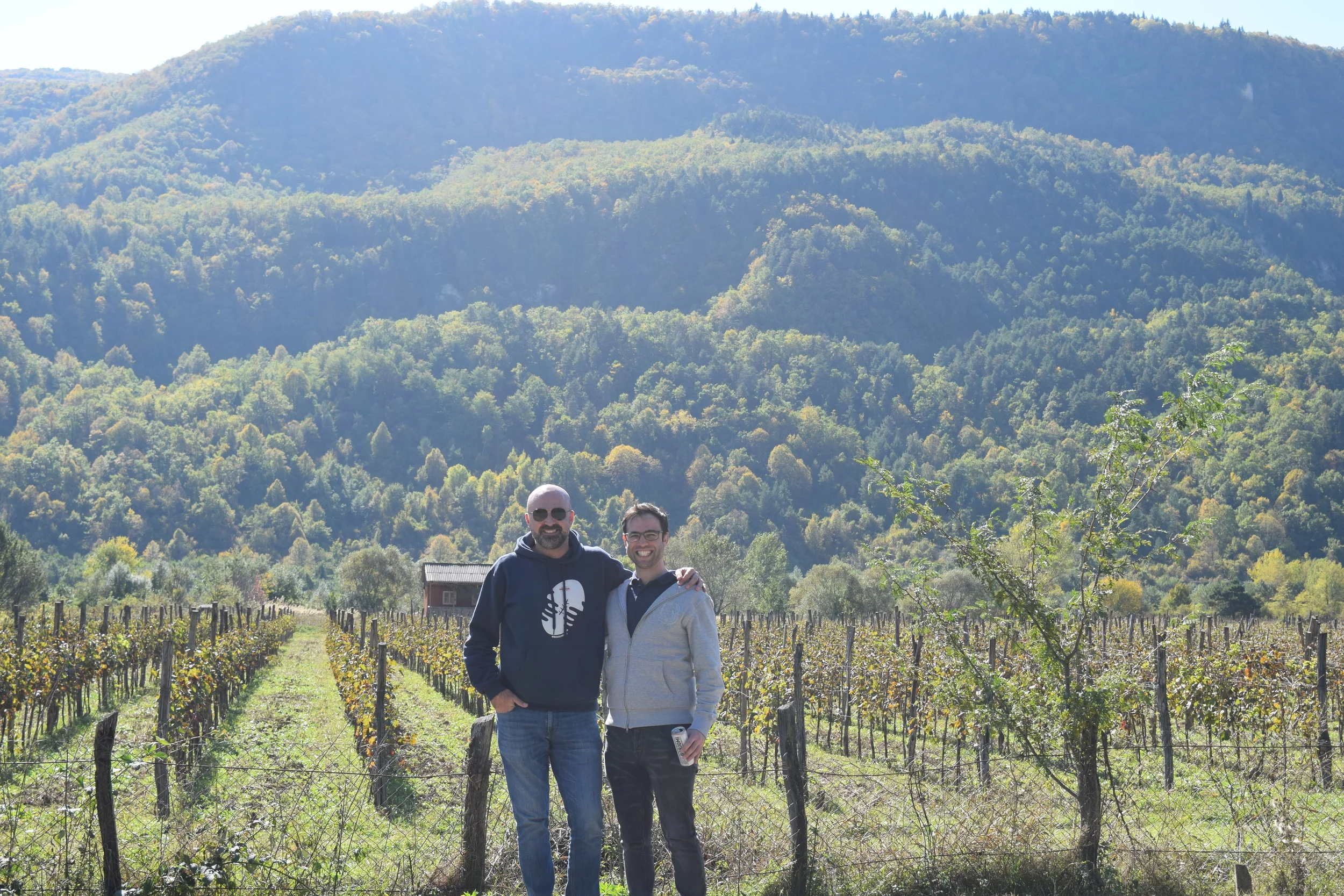 The two owners in a vineyard in the mountains of Racha where Royal Khvanchara semi sweet and dry wine is made