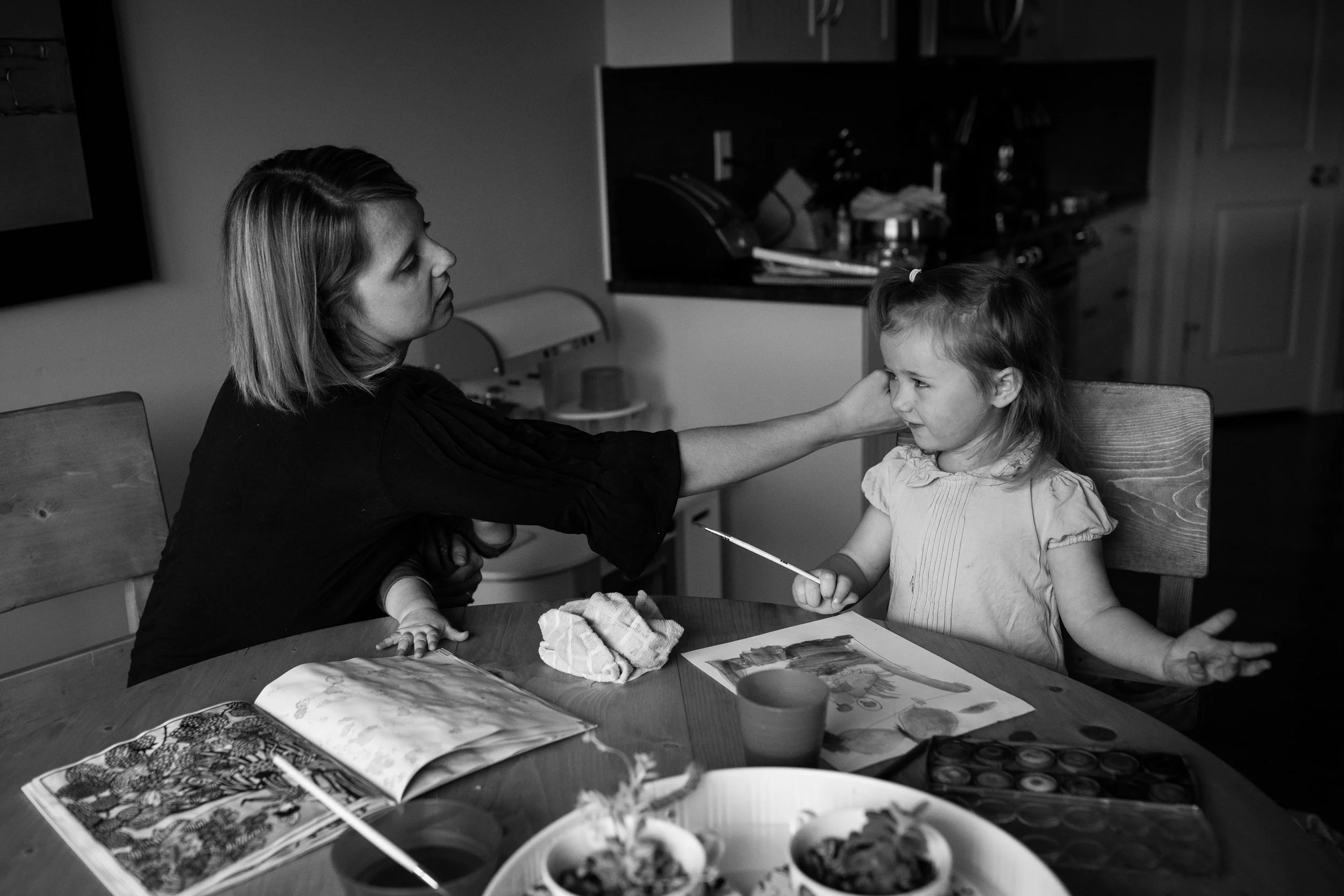 caring mother confused toddler