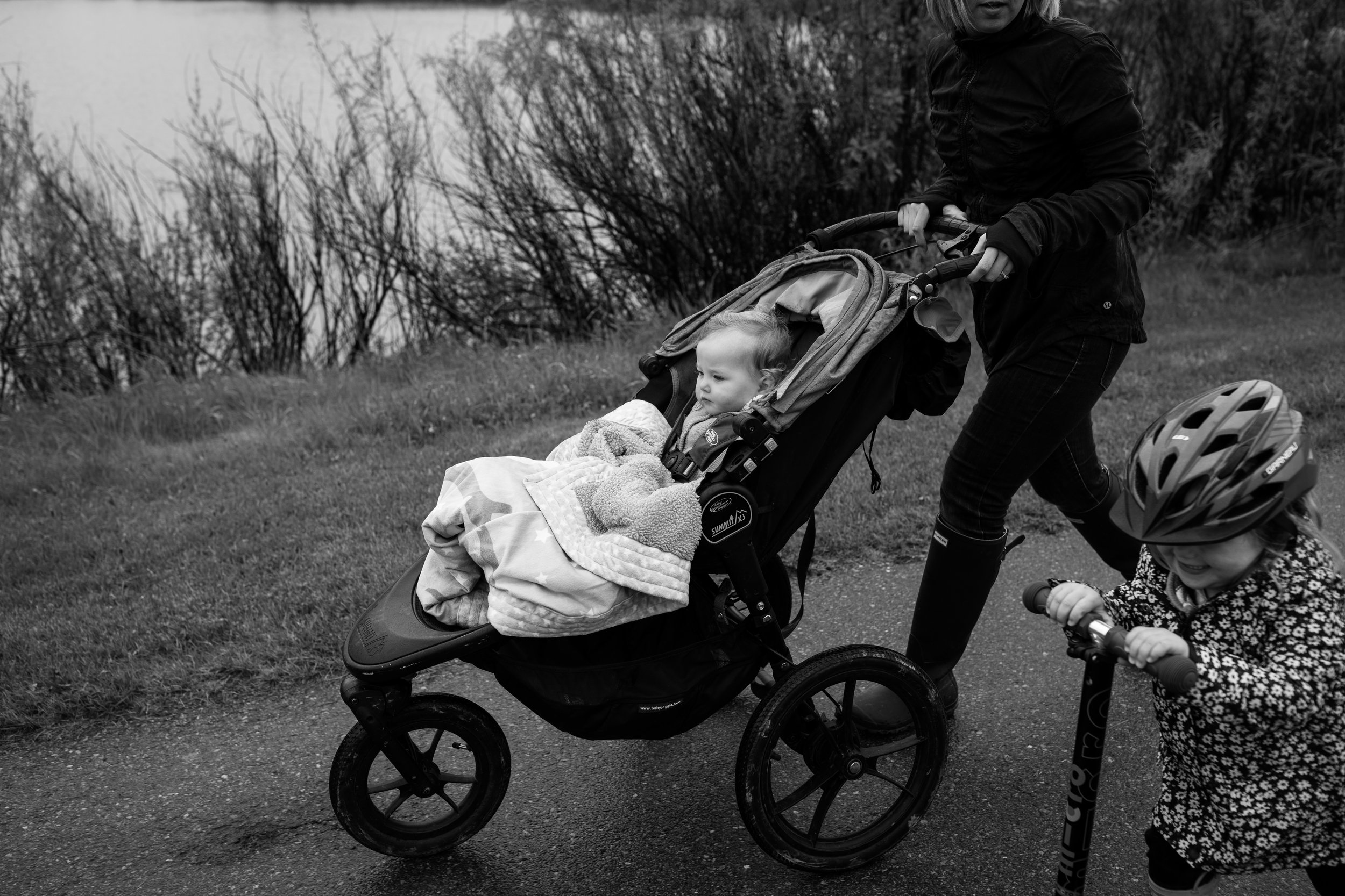 rainy walk with stroller and scooter