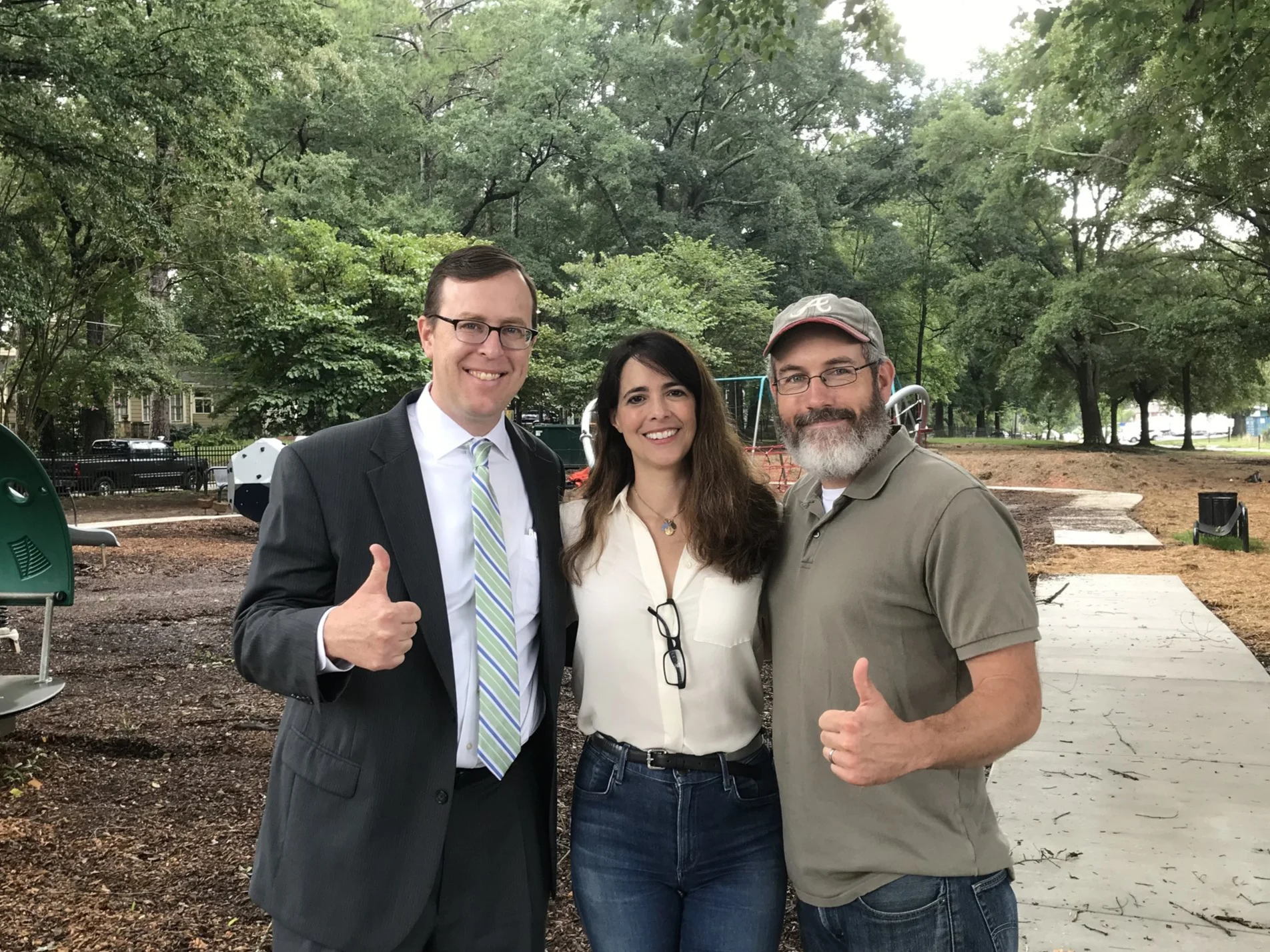 Michael Halicki, Park Pride Executive Director (left); González Whitaker; John Ahern, Park Pride Volunteer Manager, at the Sara J. González Park while it was under construction, 2018.