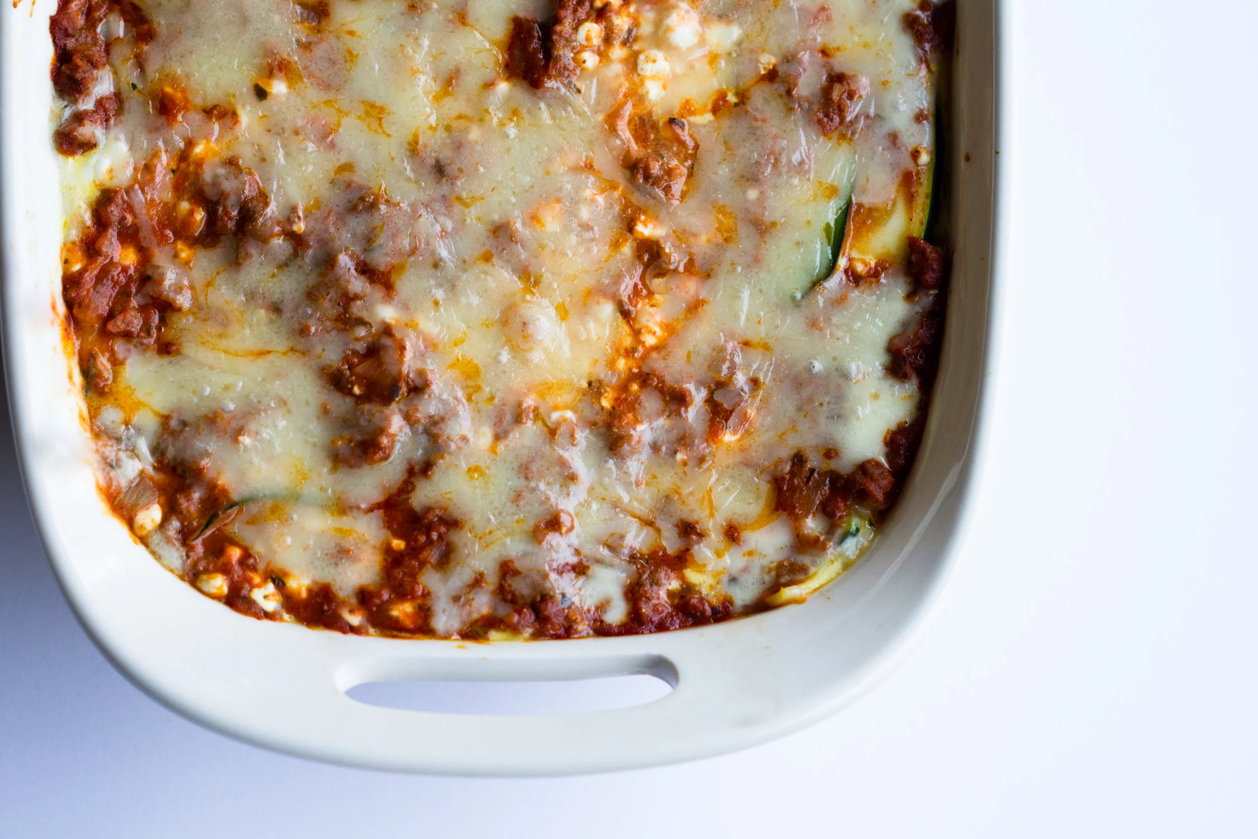 zucchini lasagna in a white pan