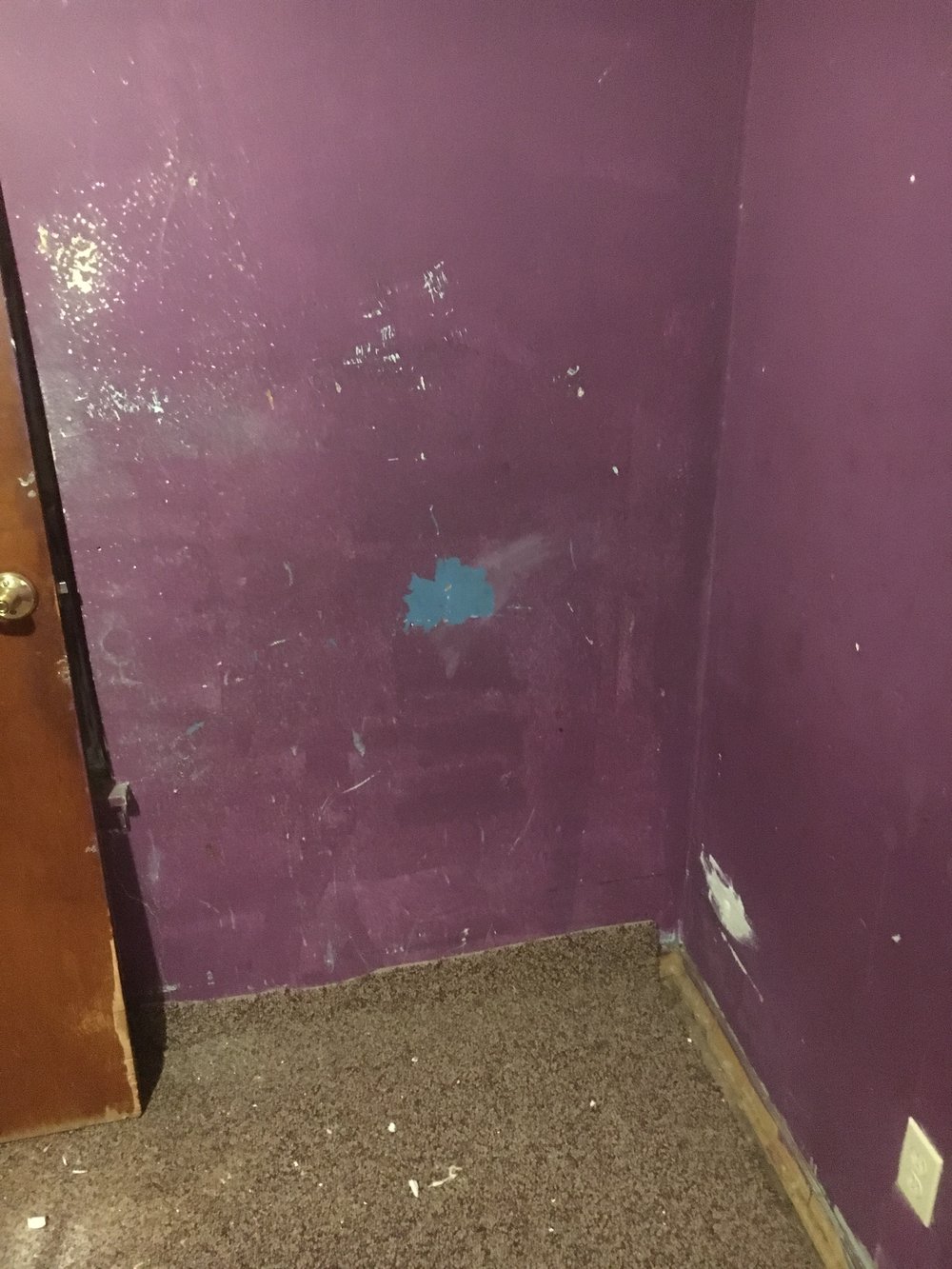 There were hundreds of little holes in the bedroom walls