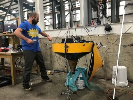 Alex works on the device between tests