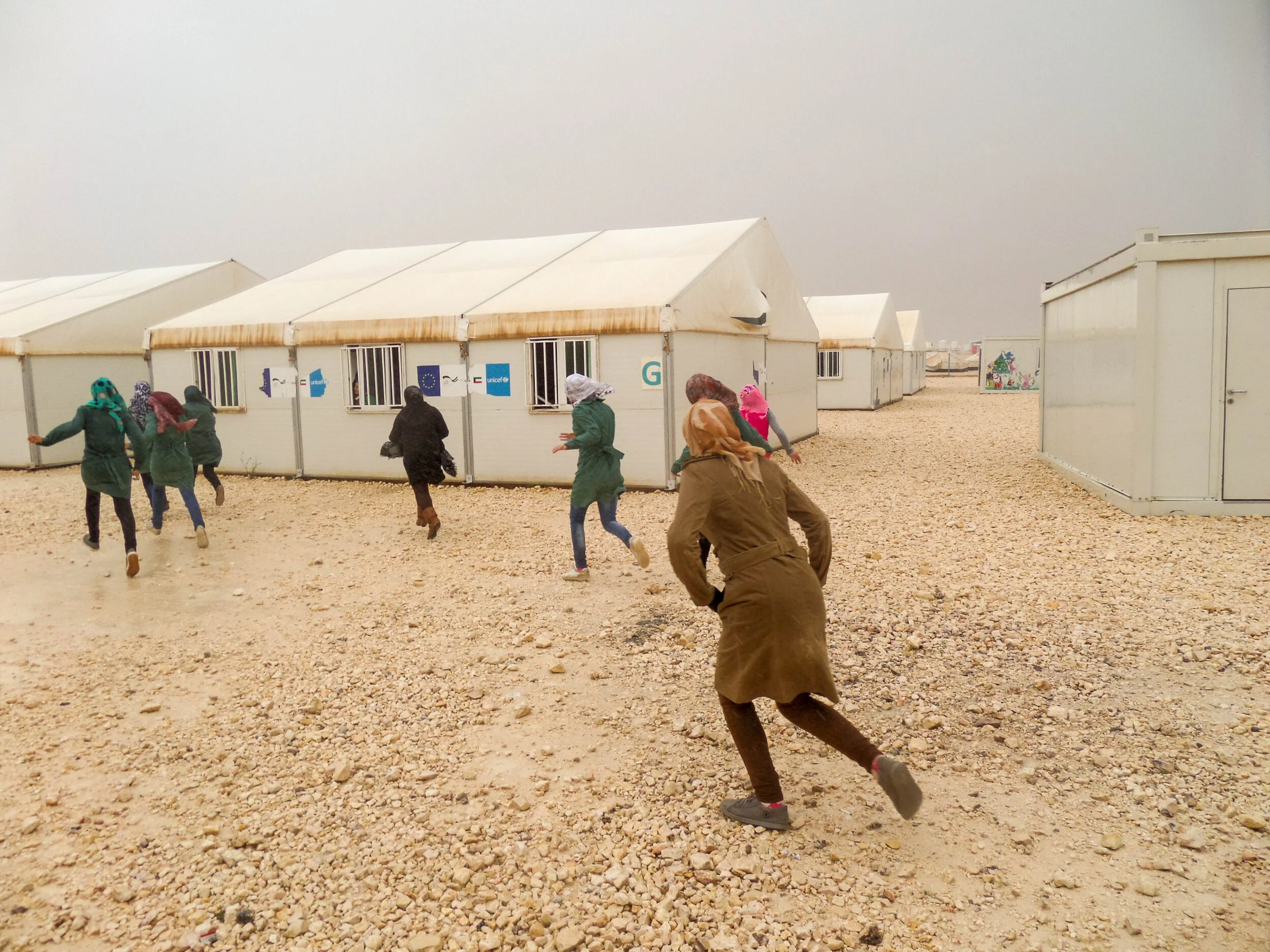 _25balqees.girlsrunninginrain.jpg