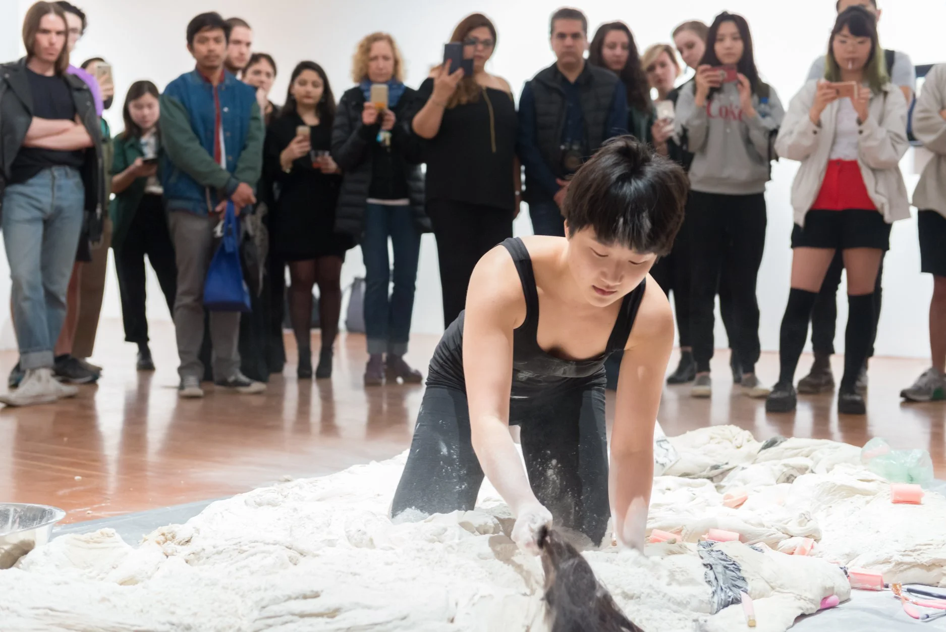 Kneading in the “objects of oppression” from UCI students’ donations as well as my own belongings and hair.