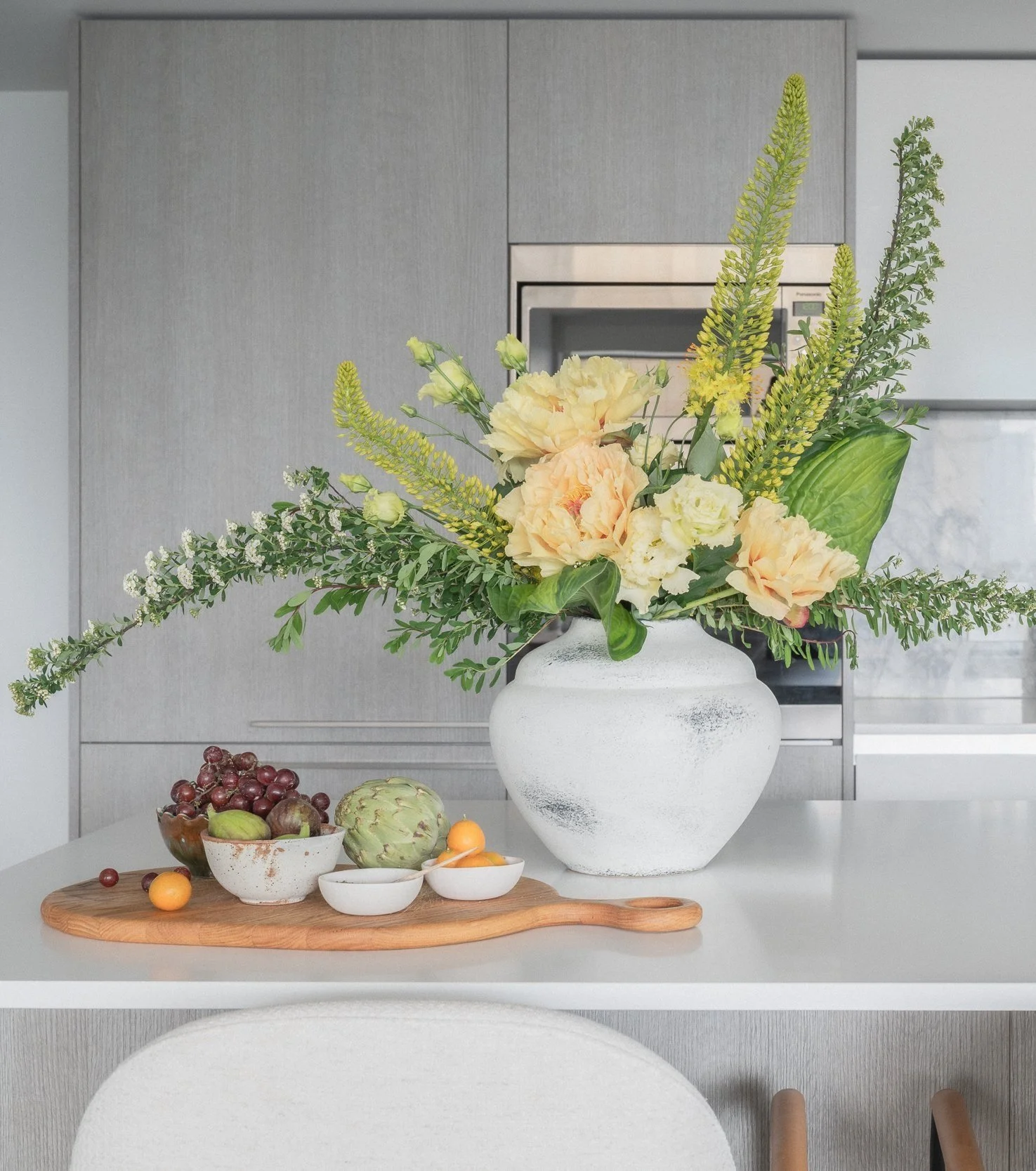 yellow-peonies-white-ceramic-vase.jpg