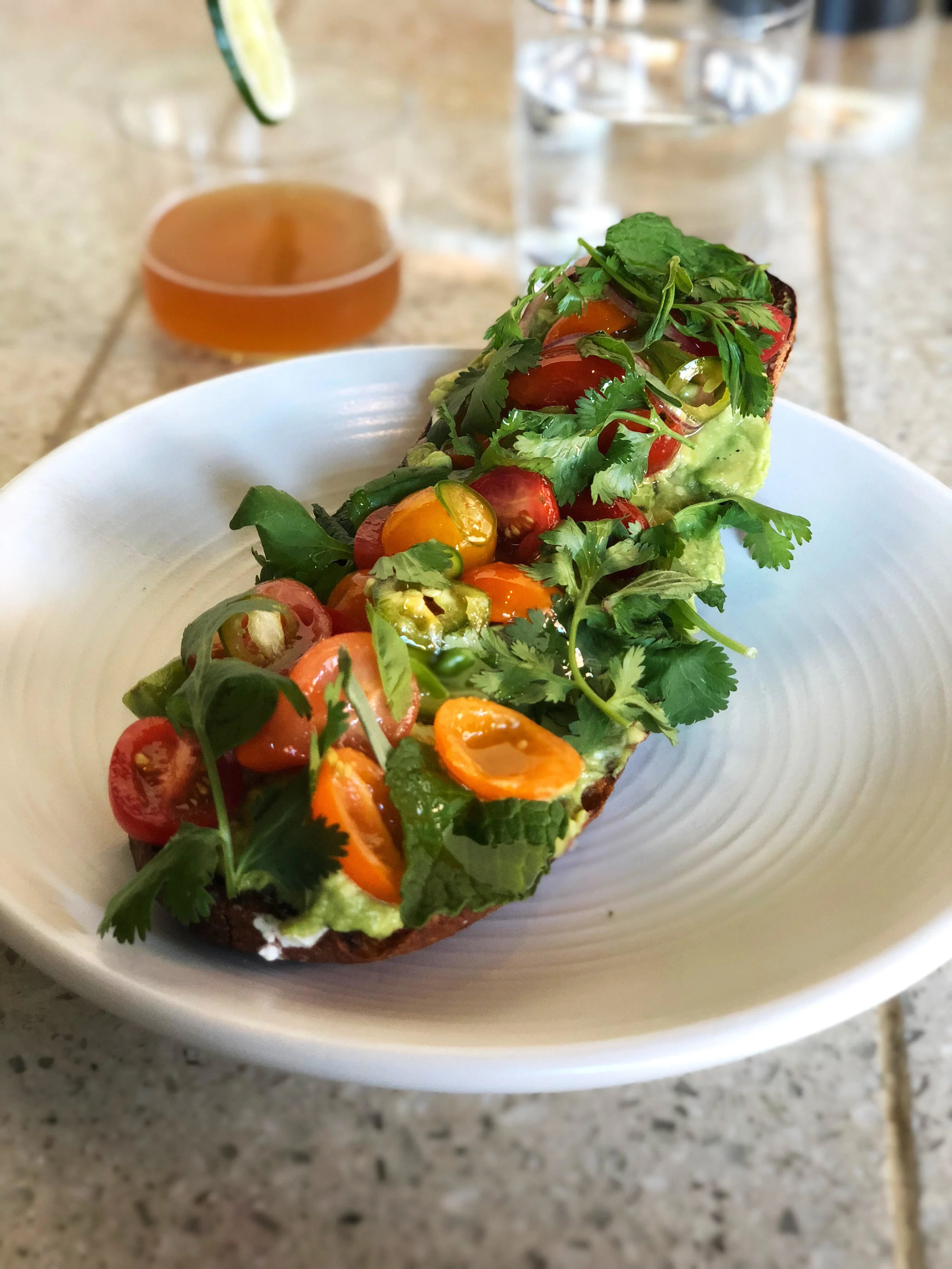 Guacamole goat cheese toast