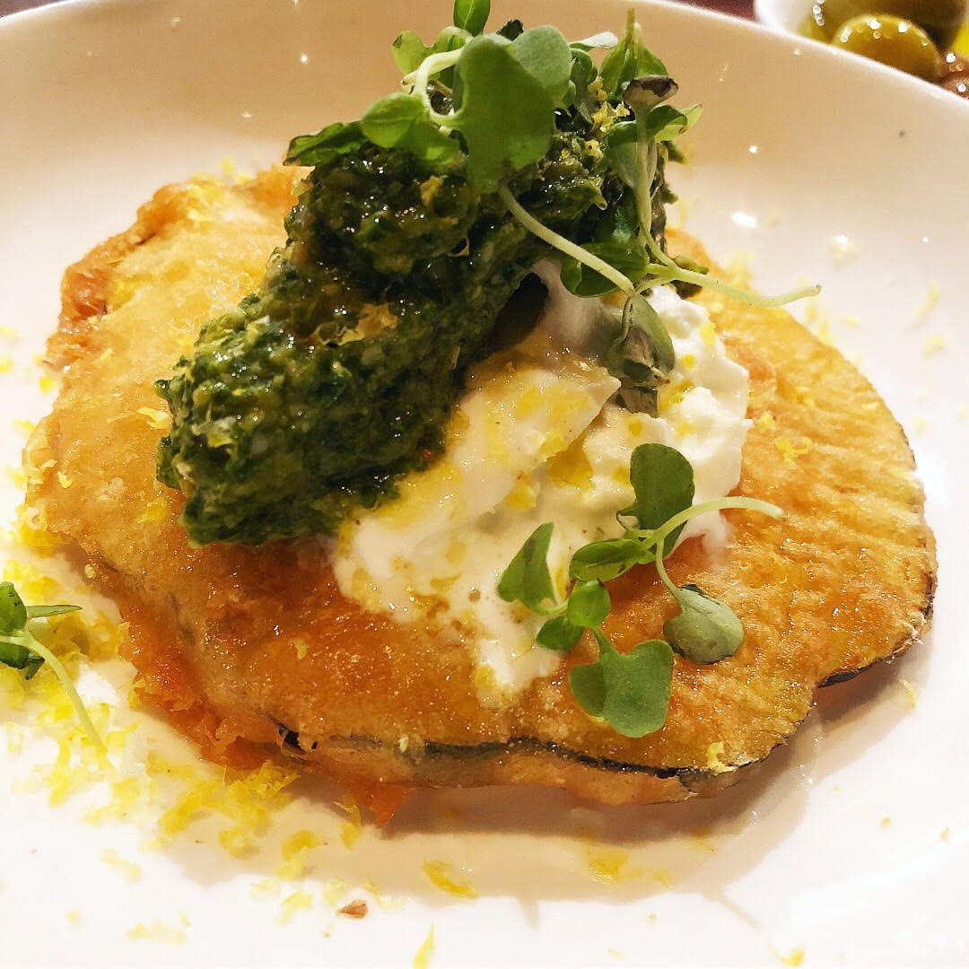 Burrata with beer battered acorn squash, marcona pesto and cured egg yolk
