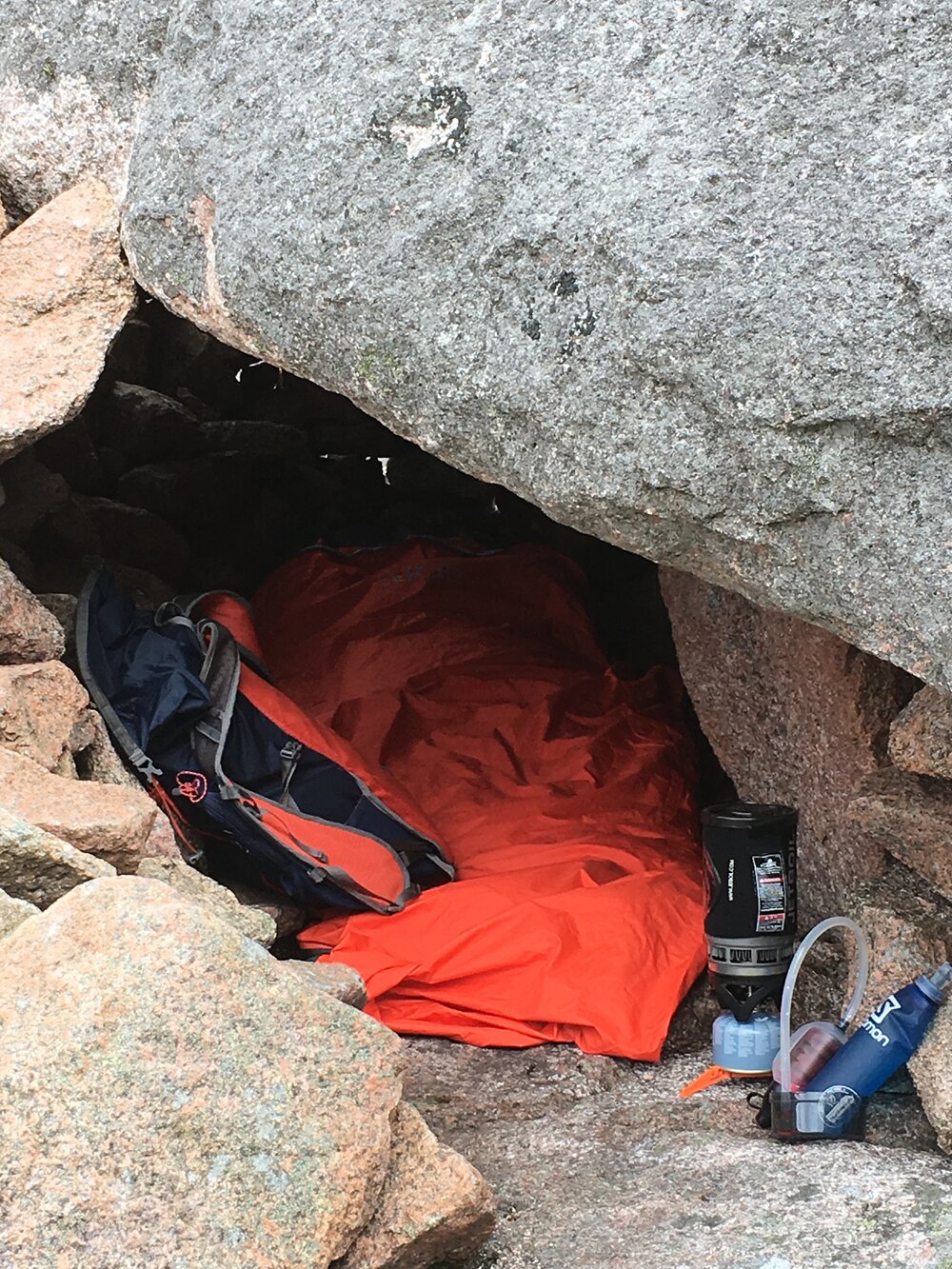 Sleeping under a rock in the Cairngorms