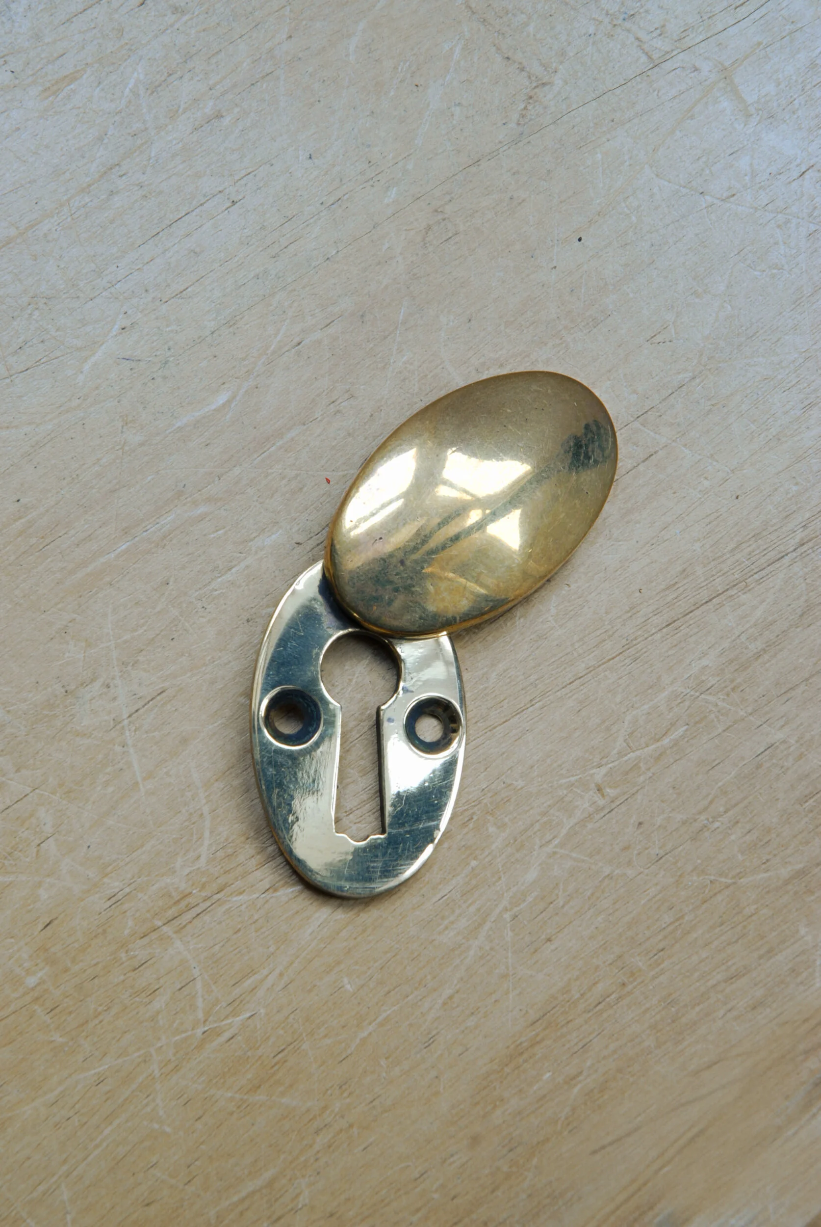 SIZED 587 Oval Escucheon Details Brass Victorian Keyhole.JPG