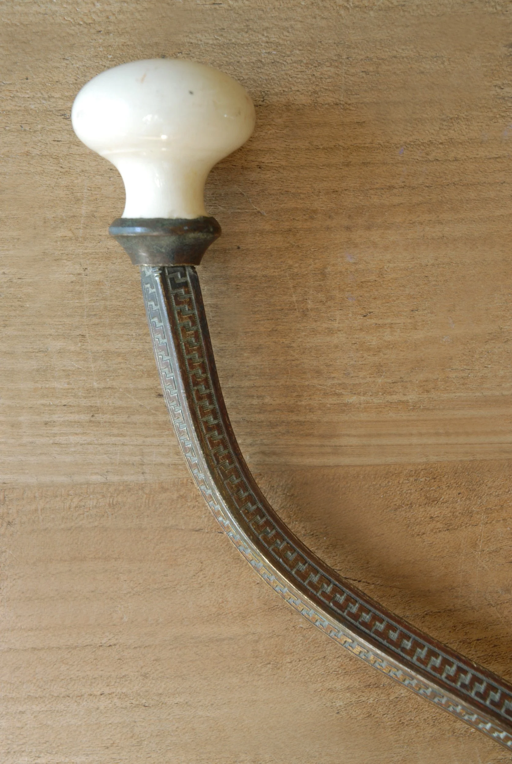 SIZED 1608 Victorian Brass & Ceramic Hook.JPG
