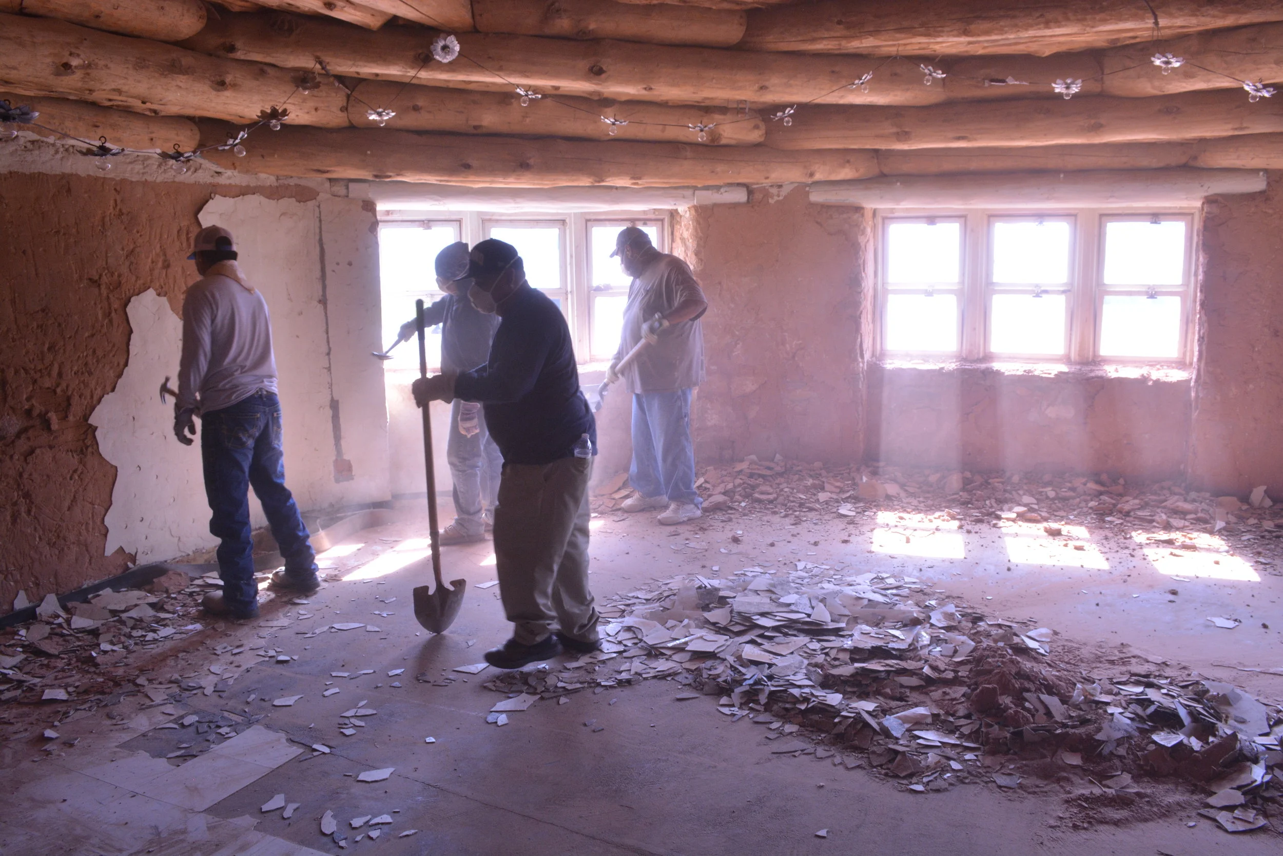 Local construction workers inside the boarding school buildings