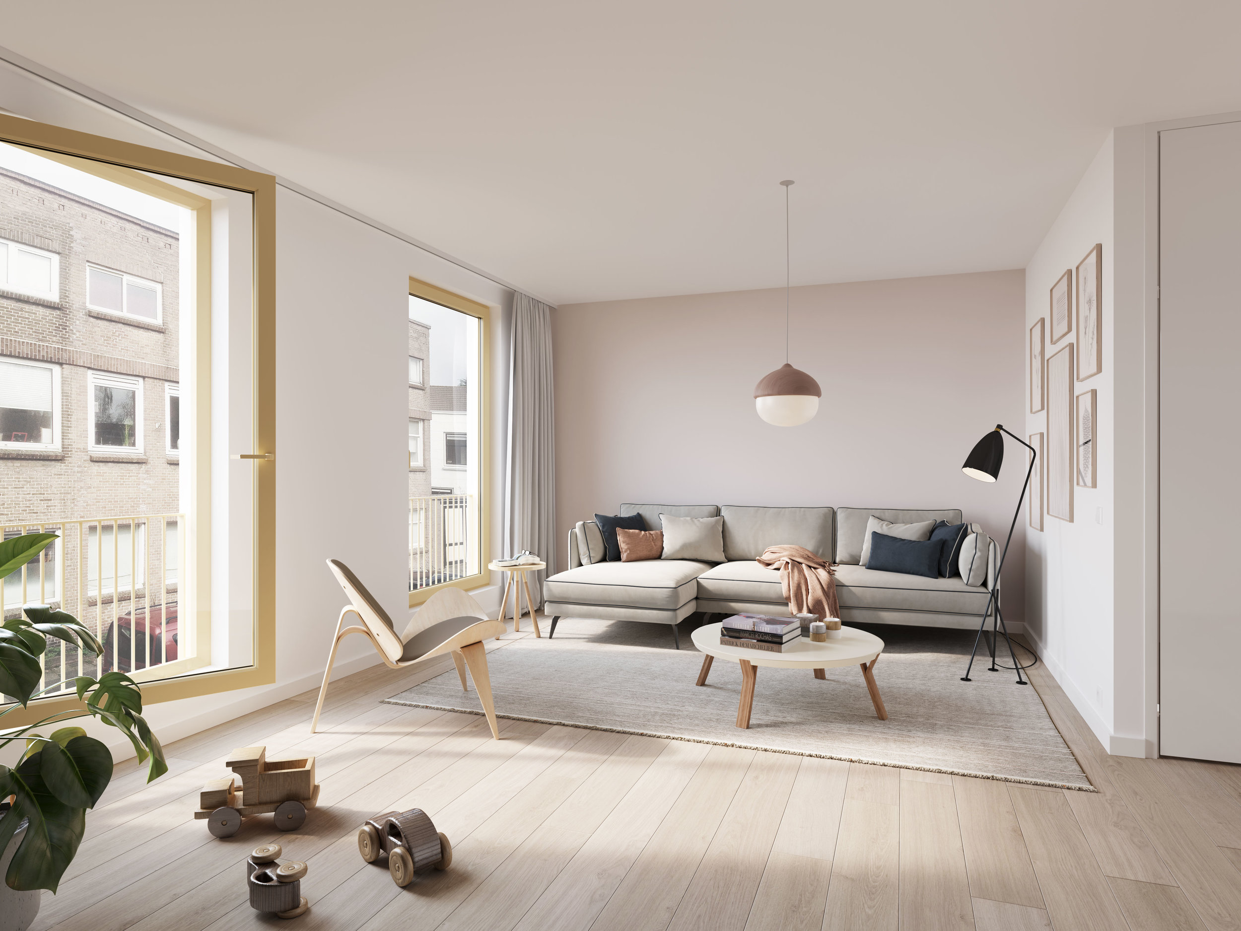 de multifunctionele ruimte op de eerste verdieping met verdiepingshoge Franse balkons, ingericht als lounge kamer met speelhoek