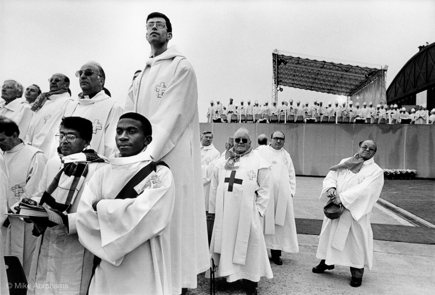  Catholic priests awaiting the arrival of the Pope. 200,000 people attend an open air mass at Reims. France 1996 