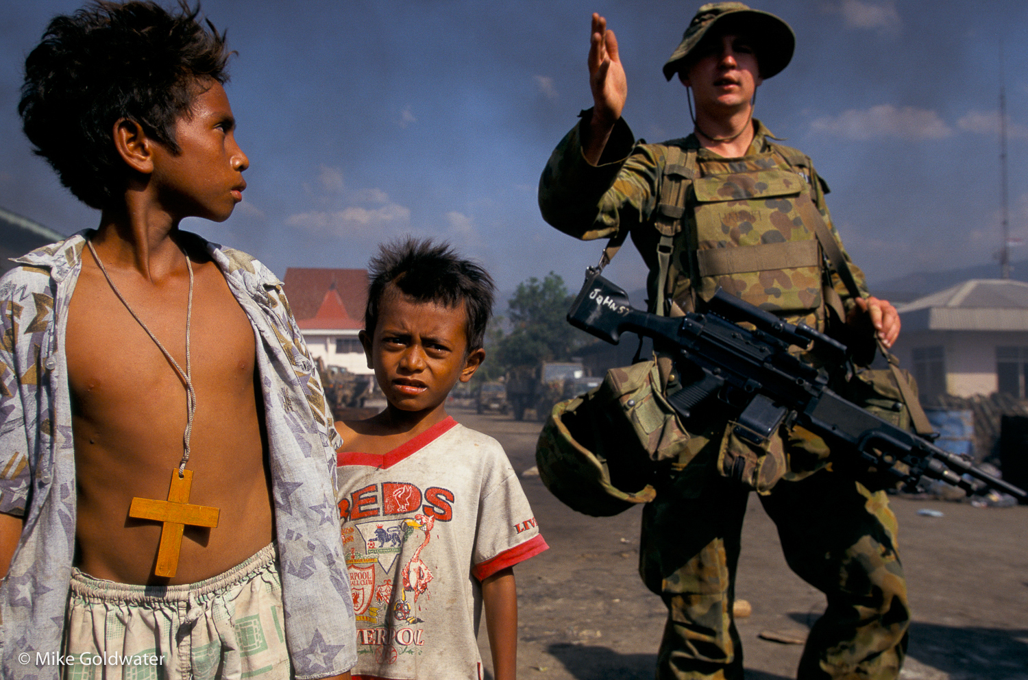  East Timor, September 1999: Displaced East Timorese children take refuge in a camp in Dili protected by Australian troops. 