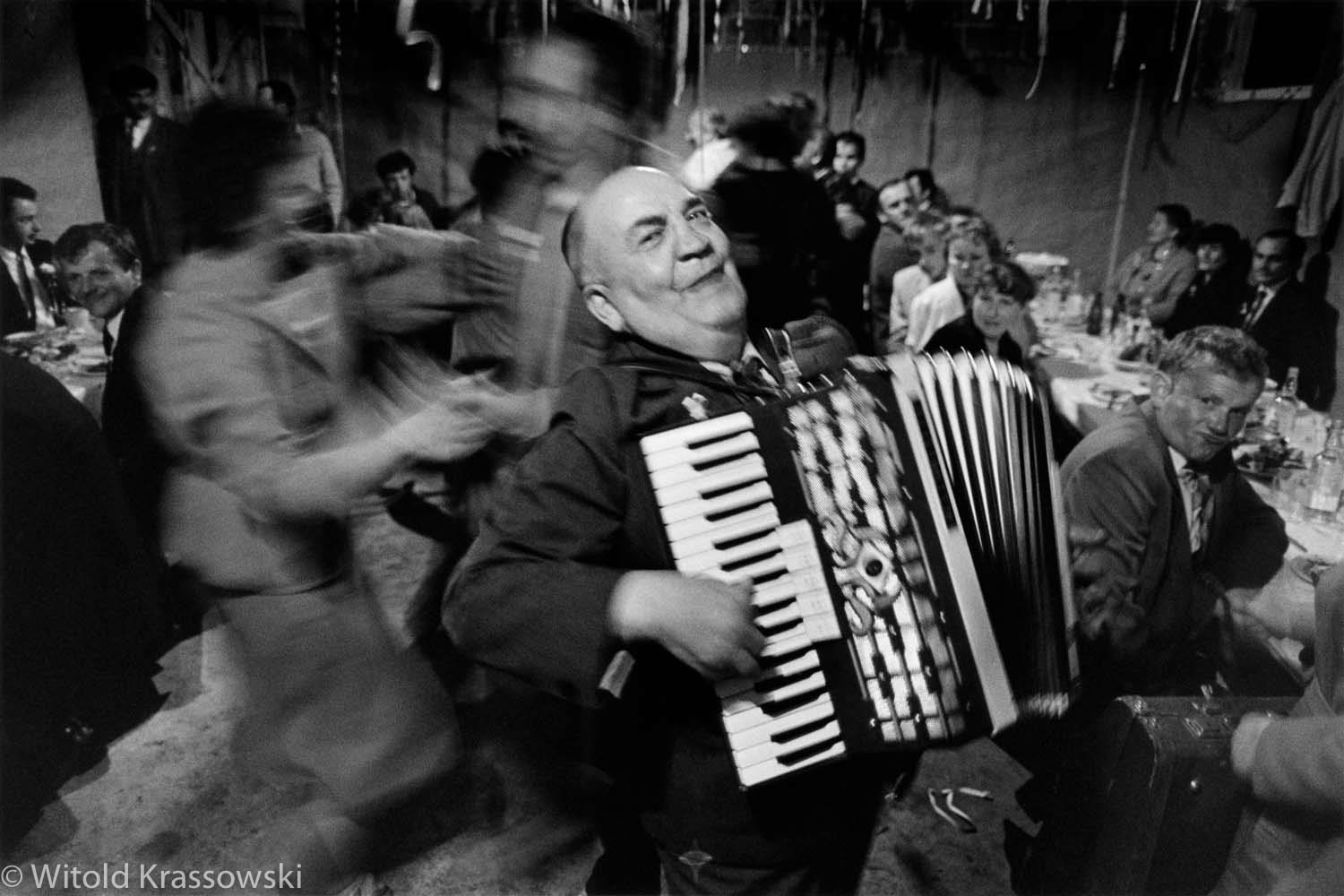  An accordion player during a wedding party in a small village near Tomaszow Lubelski, S-E Poland, 1989 