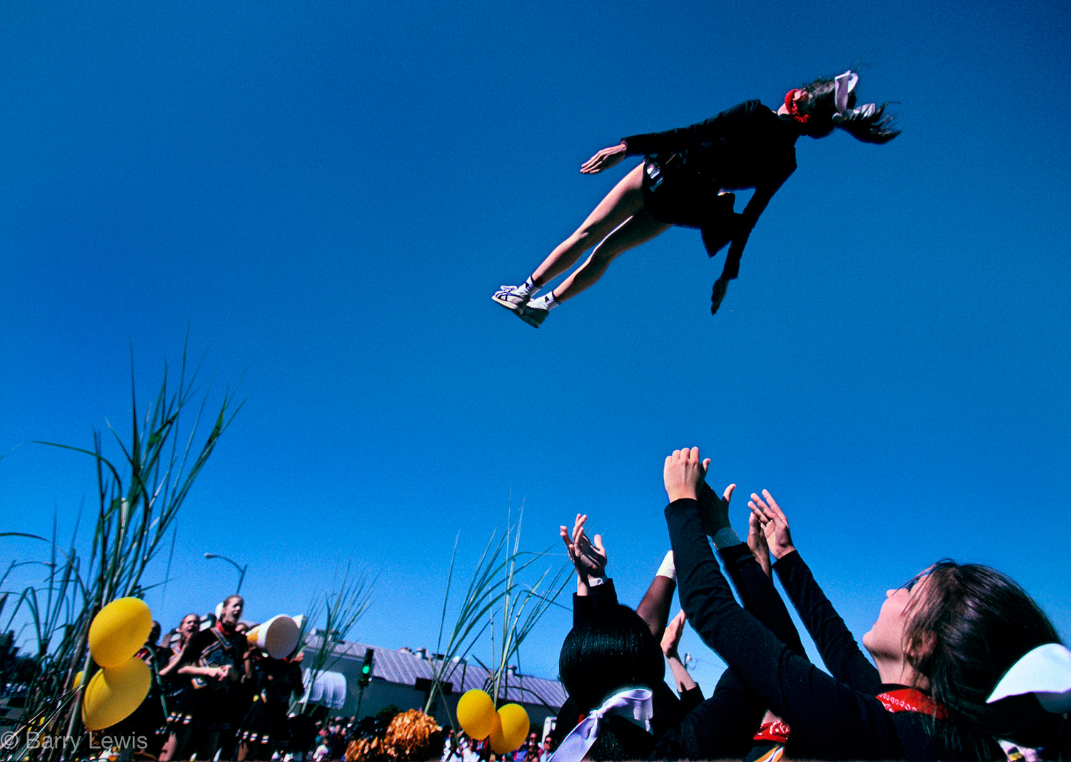  New Iberia Sugar Cane Festival, Louisiana, 1996. Cheerleader rocket launch. 