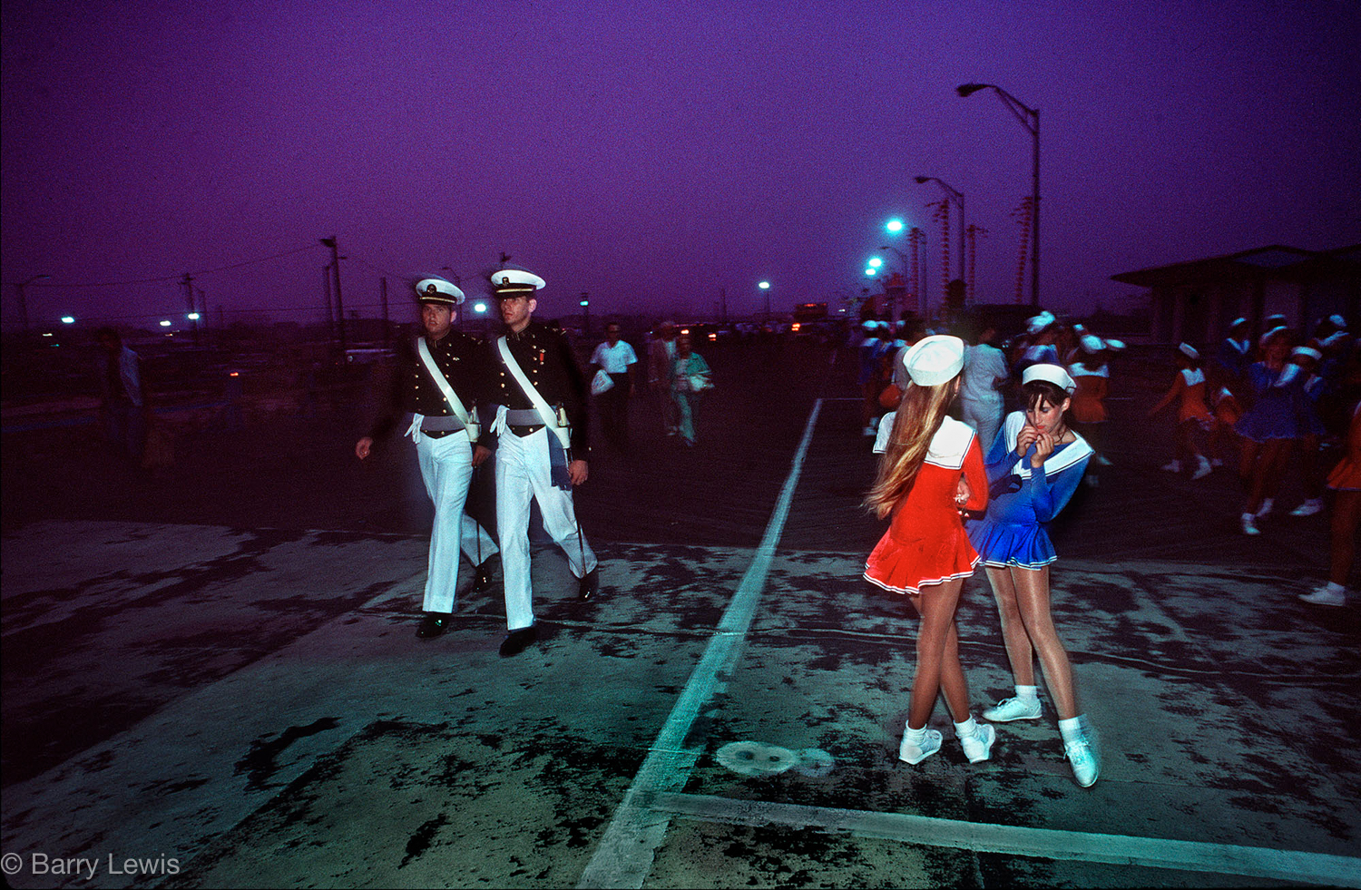  Soldiers and sailors gather on the Boardwalk after the Miss America parade, Atlantic City, USA, 1984 