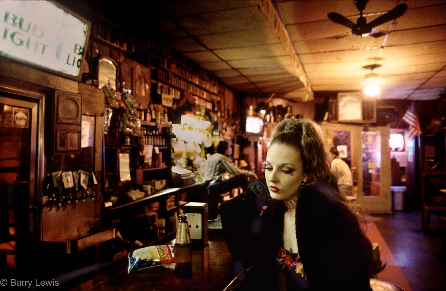 Girl drinking in the Starlight Bar, Little Five Points, Altlanta, USA. 1995