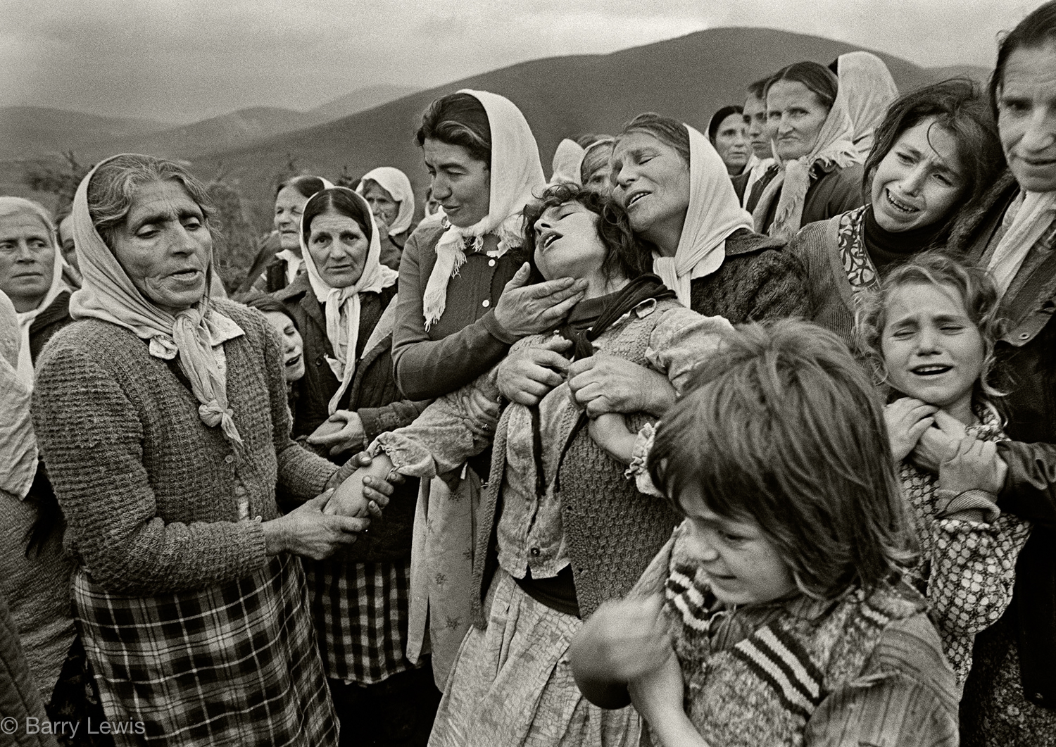  The Muslem funeral of 23 year old Baghkim Sinani in the mountain village of Kalimash, in the mountains of High Albania, 1991. 