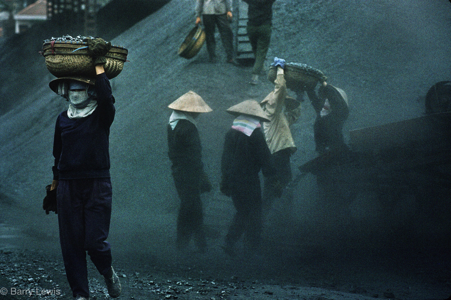  Women sorting coal in Vietnam's largest open cast mine, started by the French a century ago. Cam Pha 1993. 