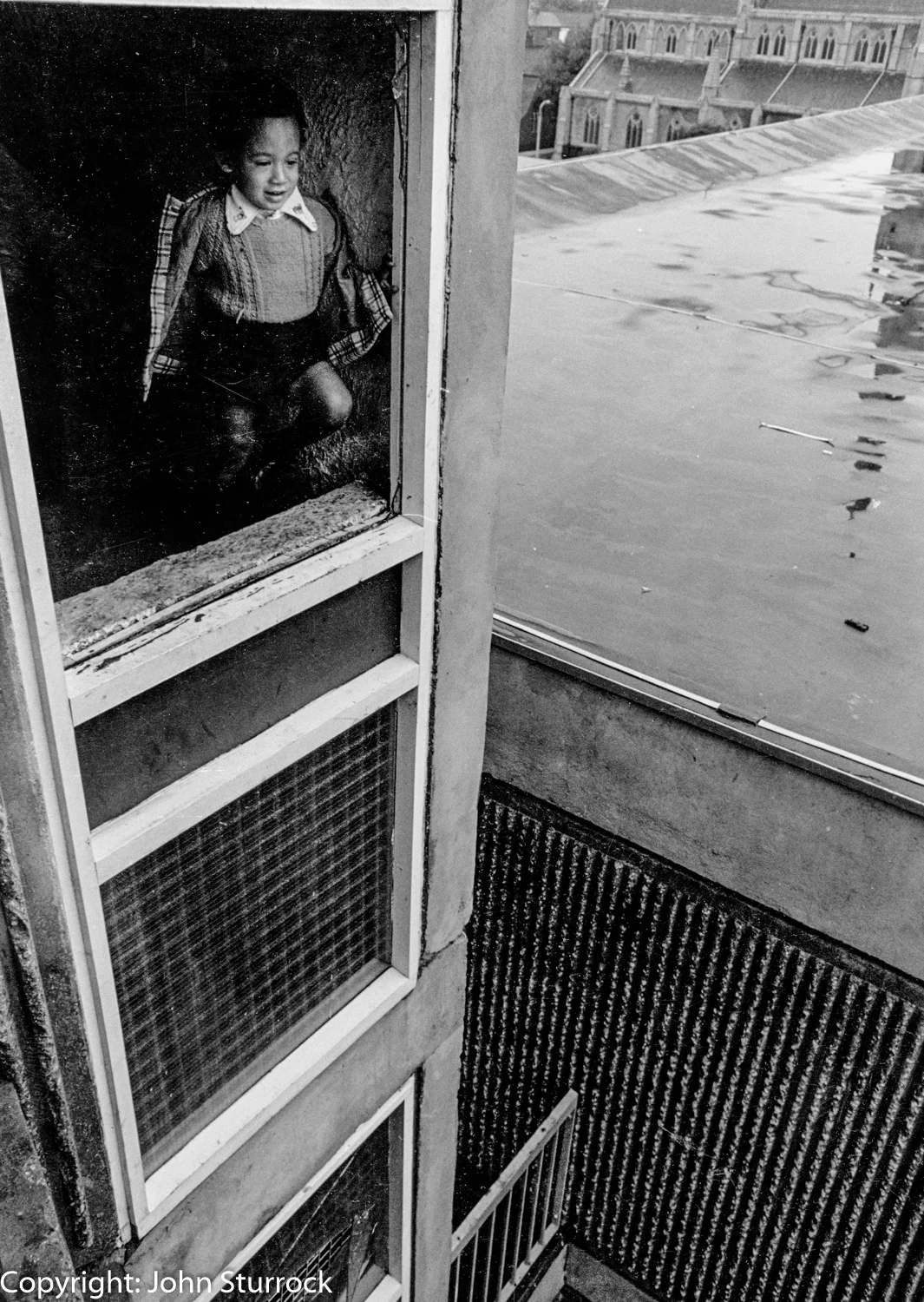 Dangerous stairwell in council flats, Moss Side, Manchester 1974