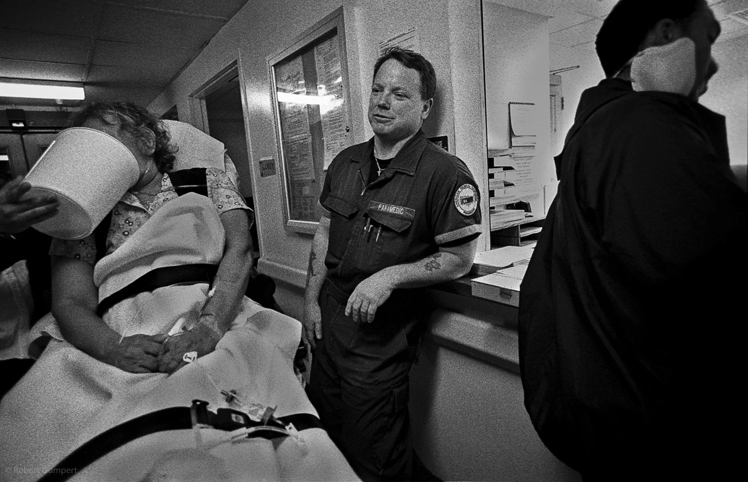 First Contact Project. Paramedics in Alameda County, CA. 2003. Triage area Highland Hospital where paremedics and the patients they bring in wait why a triage nurse works up the patient's condition and does the paperwork.